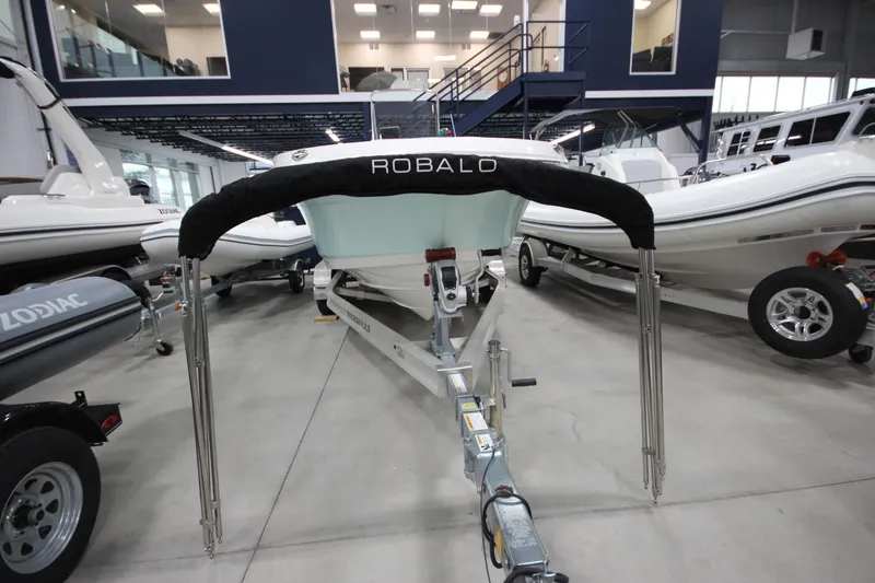 Slide: The Image of 2016 Robalo R200 Center Console boat on trailer in showroom. - 45