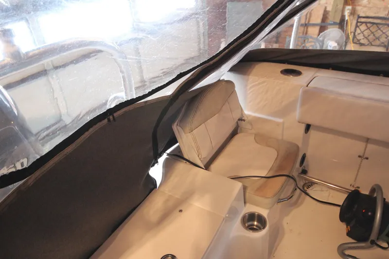 Slide: The Image of 2016 Robalo R200 Center Console interior with seating and steering wheel. - 8