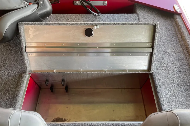 Slide: The Image of Open storage compartment in 2024 Tracker Bass Tracker Classic XL boat. - 13