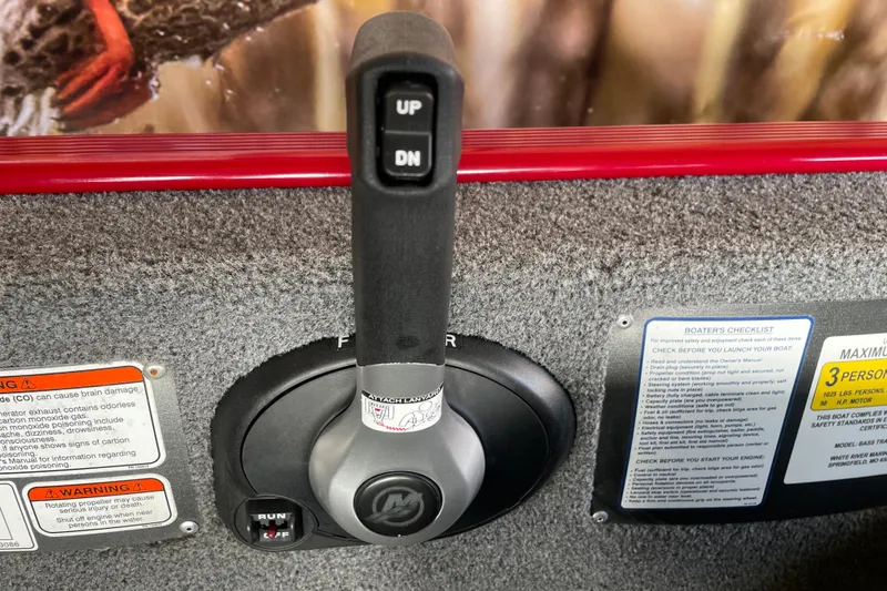 Slide: The Image of 2024 Tracker Bass Tracker Classic XL throttle control with safety warnings and boater's checklist. - 5