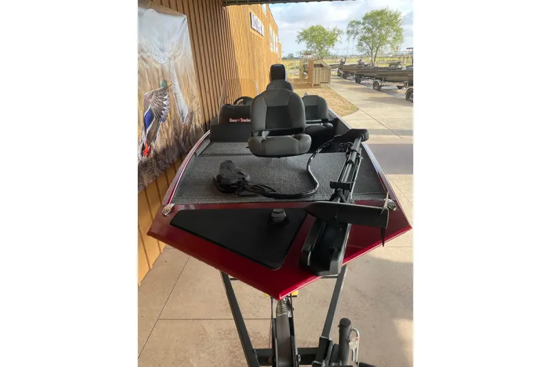 Slide: The Image of 2024 Tracker Bass Tracker Classic XL boat with seating and fishing equipment. - 9