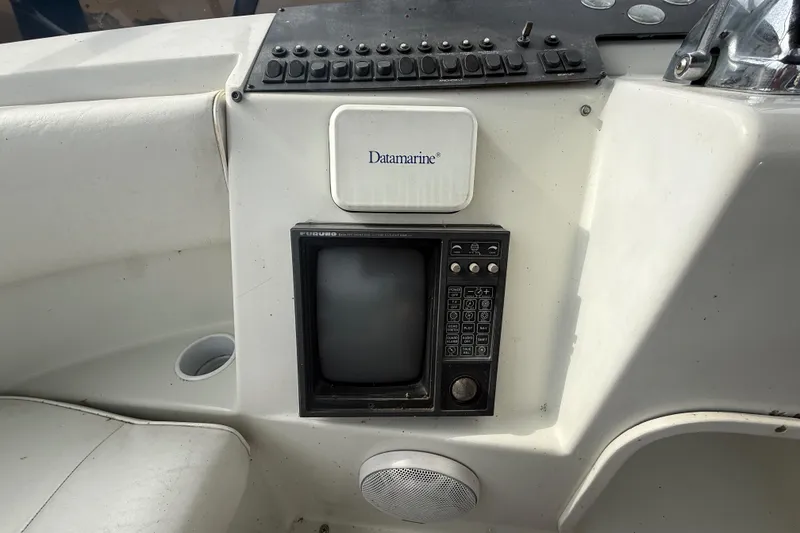 Slide: The Image of Control panel of a 1992 Silverton 41 Motor Yacht with Datamarine equipment. - 15