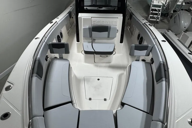 Slide: The Image of 2026 Robalo R300 Center Console boat interior with spacious seating and modern design. - 10