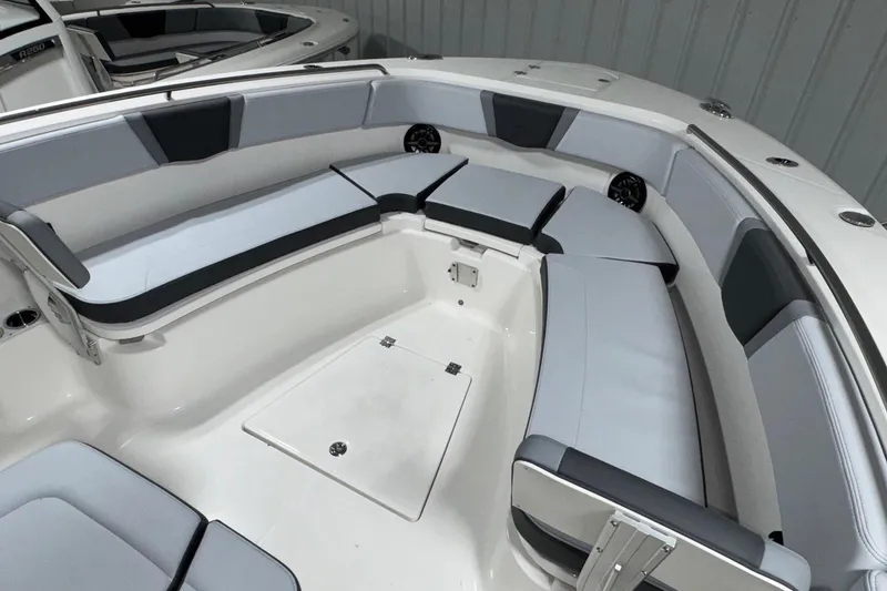 Slide: The Image of 2026 Robalo R300 Center Console boat interior with spacious seating and modern design. - 11