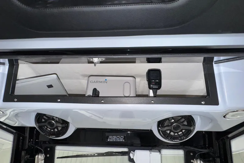 Slide: The Image of 2026 Robalo R300 Center Console with Garmin electronics and audio system. - 7