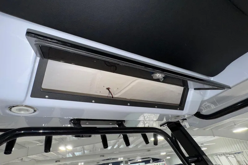 Slide: The Image of 2026 Robalo R300 Center Console boat interior storage compartment. - 8