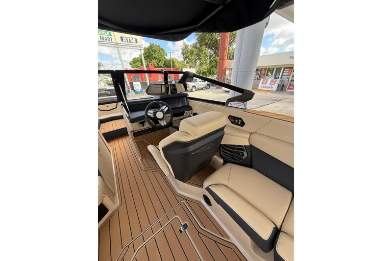 Slide: The Image of Interior of 2026 Nautique Super Air Nautique G25 Coastal Edition, featuring luxurious seating and modern design. - 10