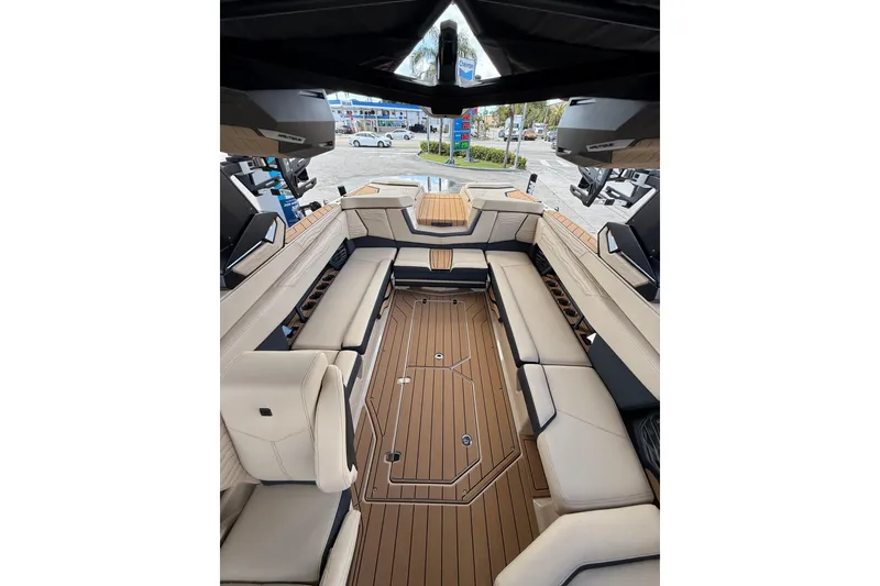 Slide: The Image of Luxurious interior of 2026 Nautique Super Air Nautique G25 Coastal Edition boat. - 14