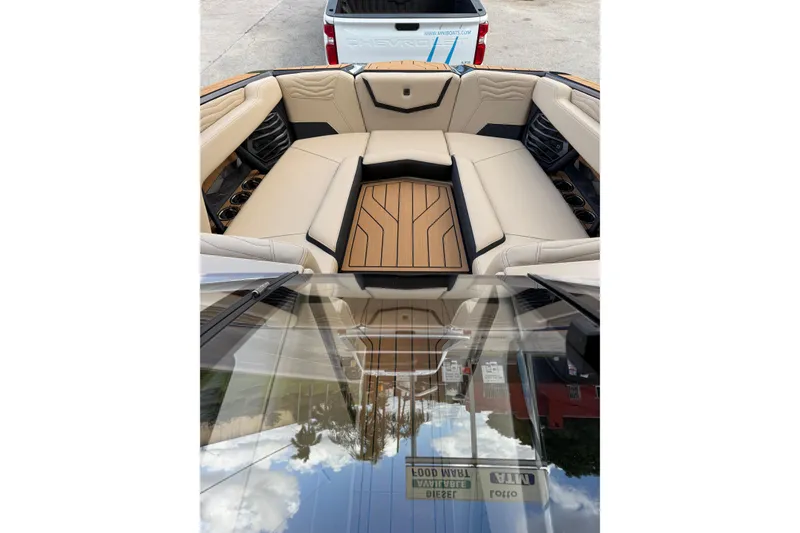 Slide: The Image of 2026 Nautique Super Air Nautique G25 Coastal Edition interior with luxurious seating and sleek design. - 15