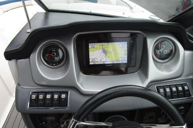 Slide: The Image of Dashboard of 2016 Chaparral 264 Sunesta boat with GPS and gauges. - 11