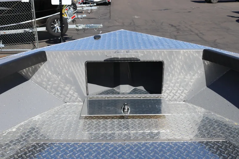 Slide: The Image of 2026 Alumaweld Columbia 21 boat deck with diamond plate finish and storage compartment. - 11