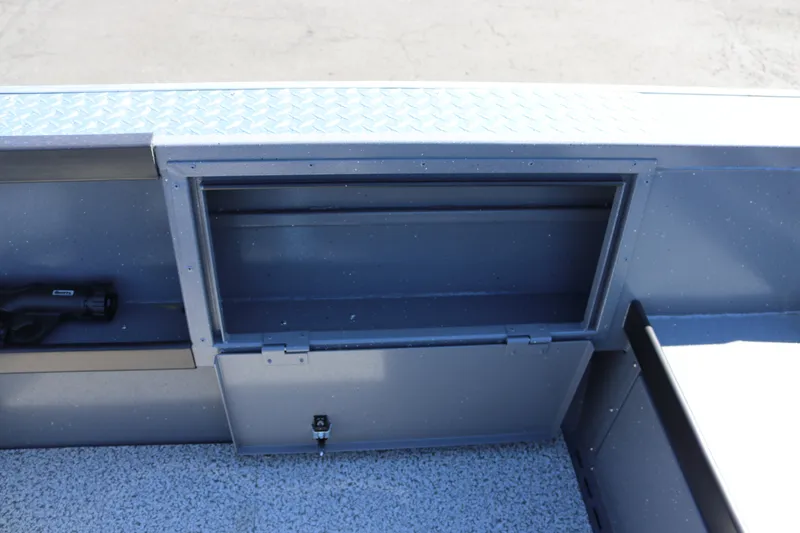 Slide: The Image of Storage compartment on 2026 Alumaweld Columbia 21 boat, featuring a secure latch and durable design. - 23