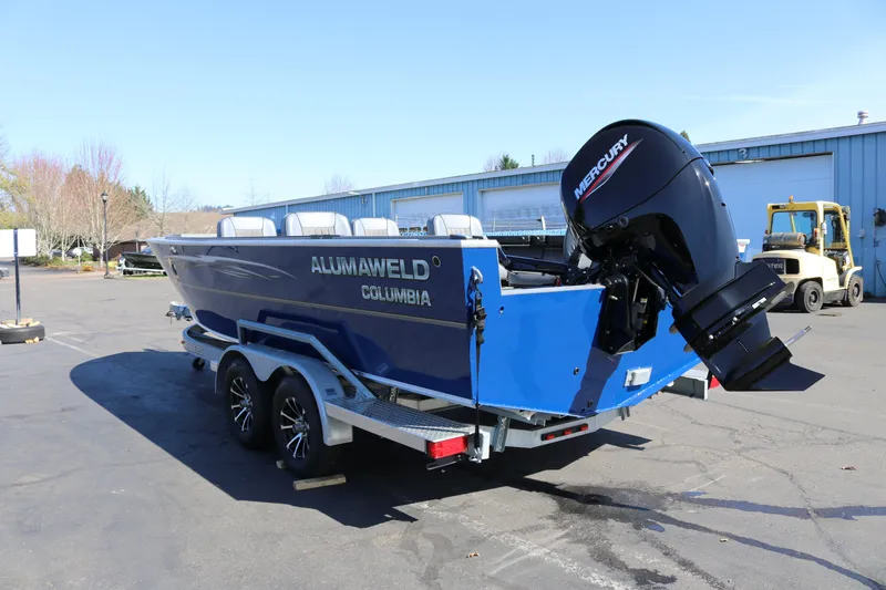 Slide: The Image of 2026 Alumaweld Columbia 21 boat with Mercury outboard motor on trailer. - 4