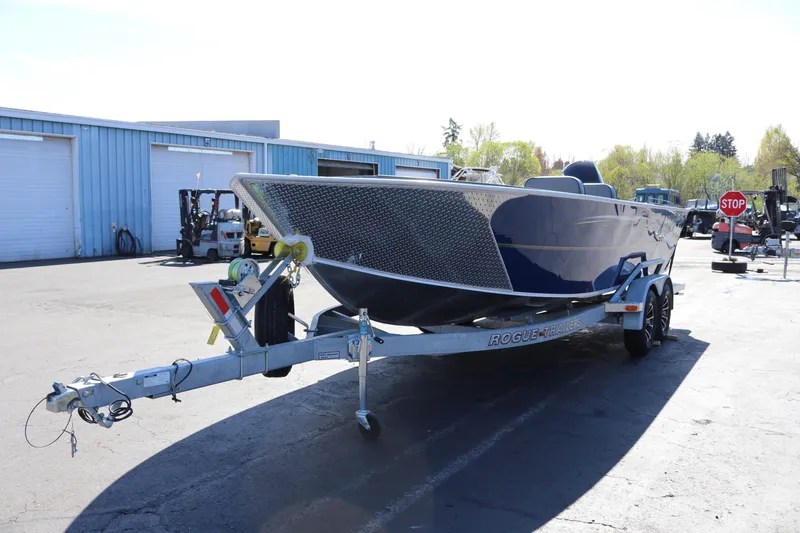 Slide: The Image of 2026 Alumaweld Columbia 21 boat on trailer in parking lot. - 6