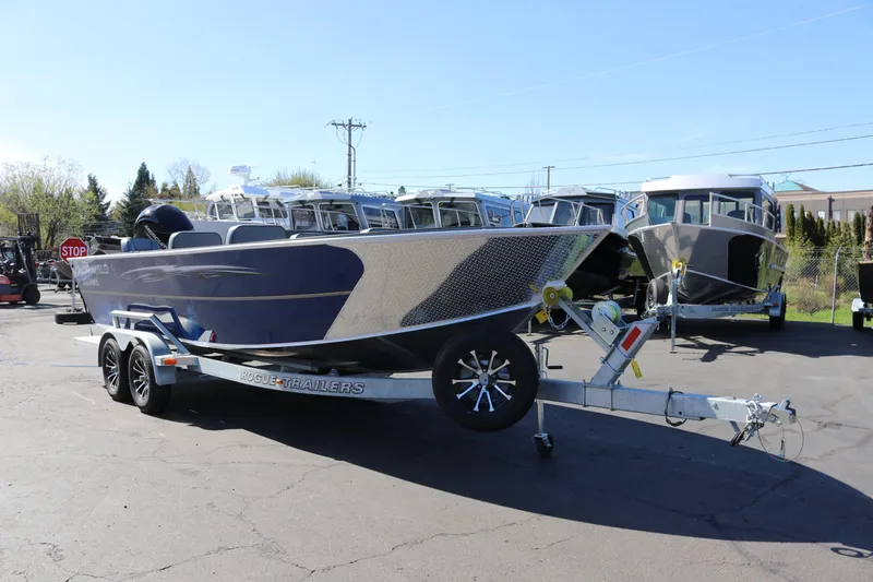 Slide: The Image of 2026 Alumaweld Columbia 21 boat on trailer in outdoor lot. - 8