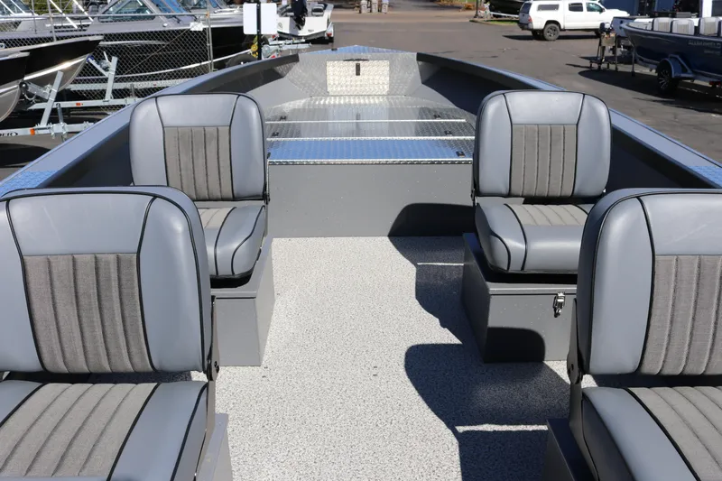 Slide: The Image of 2026 Alumaweld Columbia 21 boat interior with four gray seats, spacious layout. - 9