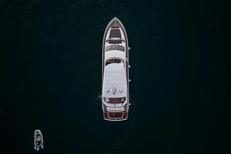 Slide: The Image of Aerial view of 2012 Sunseeker Manhattan 73 yacht on dark water. - 16