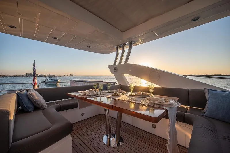 Slide: The Image of Luxurious Sunseeker Manhattan 73 yacht dining area with sunset view, 2012 model. - 27