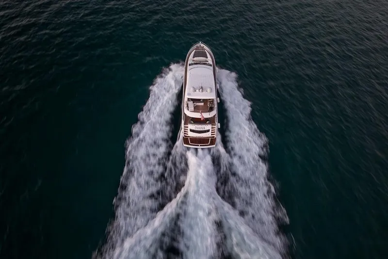 Slide: The Image of Aerial view of 2012 Sunseeker Manhattan 73 yacht cruising on open water. - 3