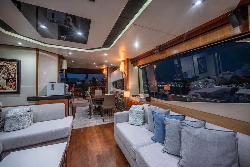 Slide: The Image of Luxurious interior of 2012 Sunseeker Manhattan 73 yacht with elegant seating and large windows. - 36