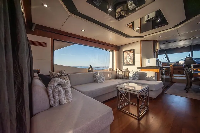 Slide: The Image of Luxurious interior of 2012 Sunseeker Manhattan 73 yacht with elegant seating and ocean view. - 38