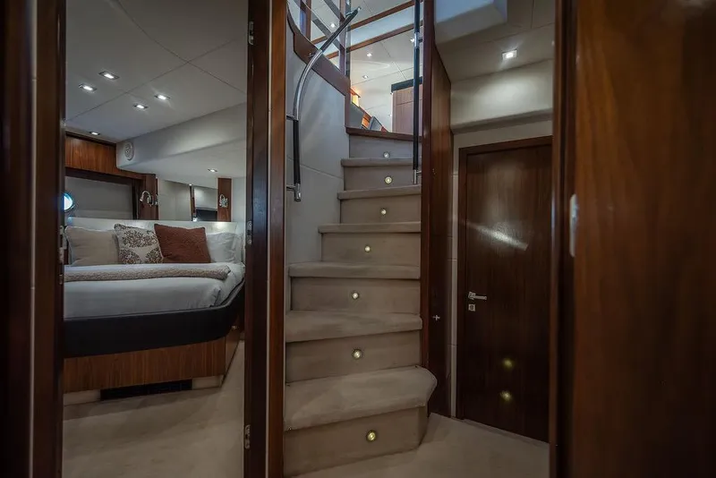 Slide: The Image of Luxurious interior of 2012 Sunseeker Manhattan 73 yacht with elegant staircase and cozy bedroom. - 48