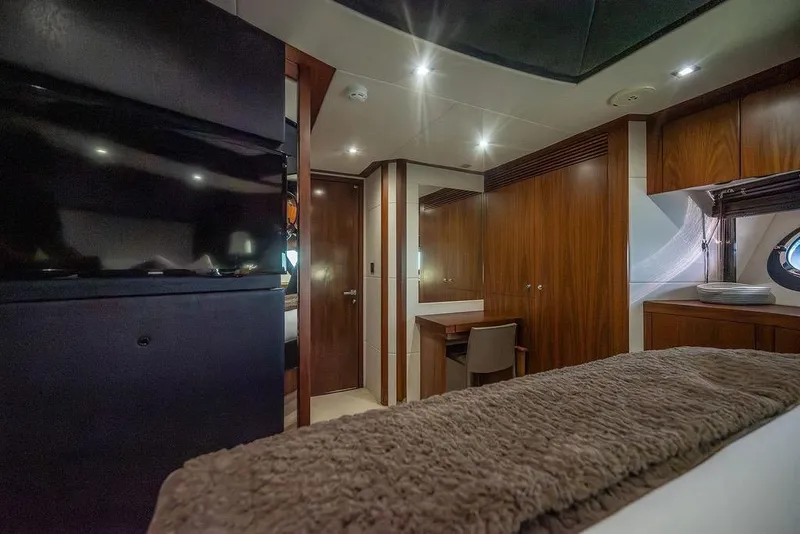 Slide: The Image of Luxurious interior of 2012 Sunseeker Manhattan 73 yacht with wood paneling and modern furnishings. - 52