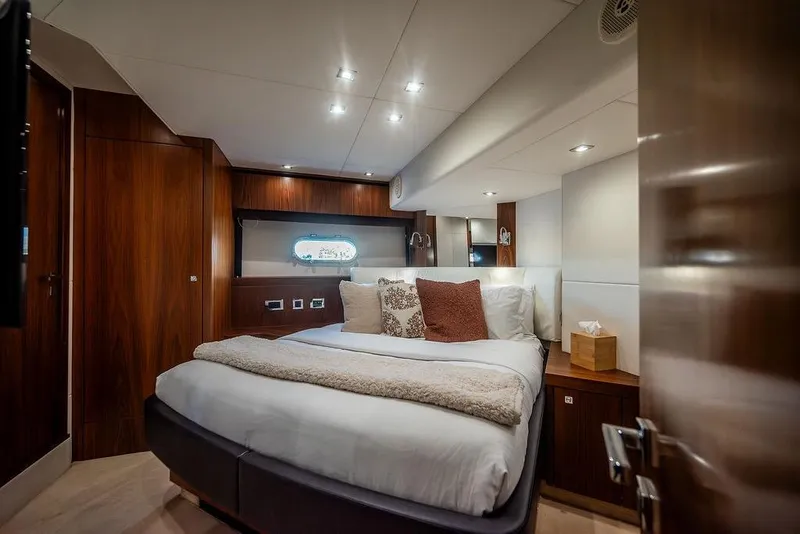 Slide: The Image of Luxurious bedroom interior of 2012 Sunseeker Manhattan 73 yacht with elegant wood finishes. - 57
