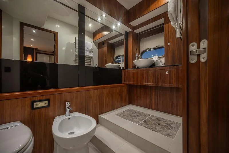 Slide: The Image of Luxurious bathroom interior of 2012 Sunseeker Manhattan 73 yacht with wood accents and modern fixtures. - 59