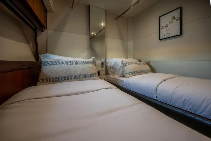 Slide: The Image of Luxurious twin cabin interior on 2012 Sunseeker Manhattan 73 yacht. - 62