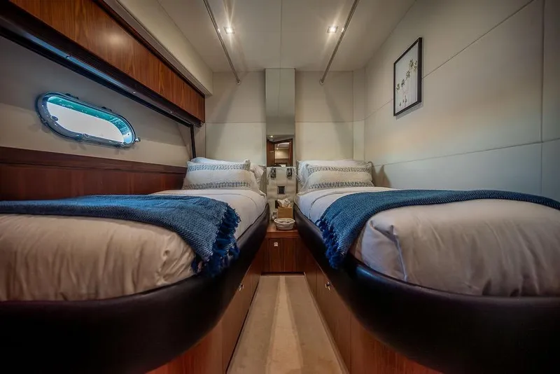 Slide: The Image of Luxurious twin cabin interior on 2012 Sunseeker Manhattan 73 yacht. - 64