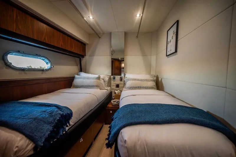 Slide: The Image of Luxurious twin cabin interior on 2012 Sunseeker Manhattan 73 yacht. - 65