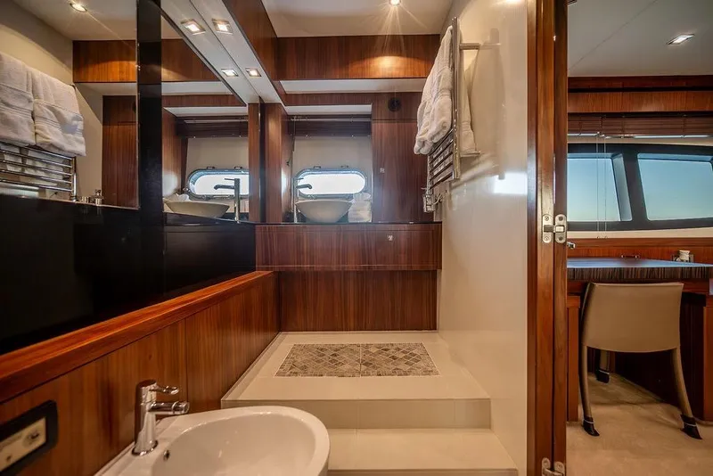 Slide: The Image of Luxurious bathroom interior of 2012 Sunseeker Manhattan 73 yacht with wood accents. - 66