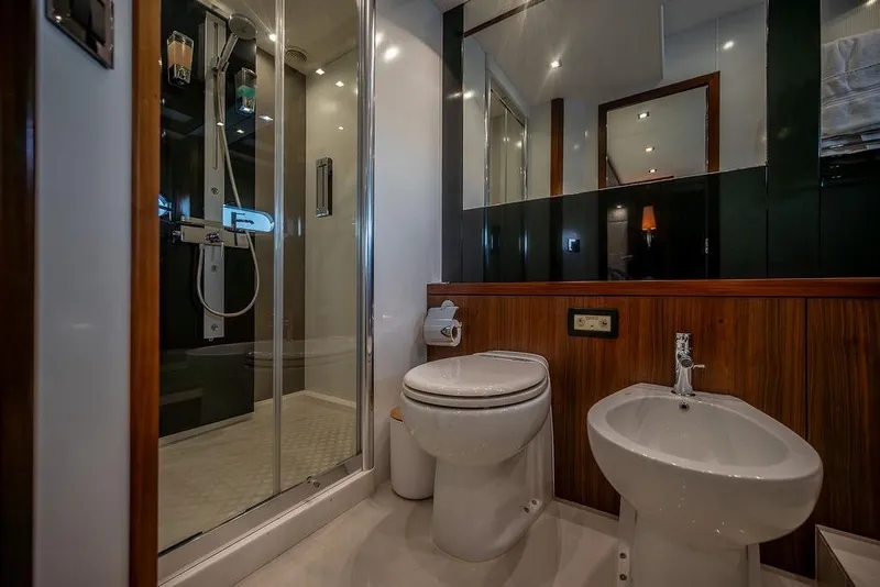 Slide: The Image of Luxurious bathroom in 2012 Sunseeker Manhattan 73 yacht with shower, toilet, and bidet. - 68
