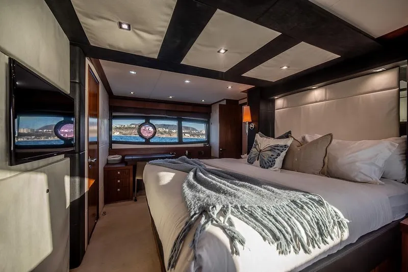 Slide: The Image of Luxurious bedroom interior of 2012 Sunseeker Manhattan 73 yacht with elegant decor. - 69