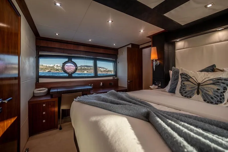 Slide: The Image of Luxurious bedroom interior of 2012 Sunseeker Manhattan 73 yacht with elegant decor. - 70