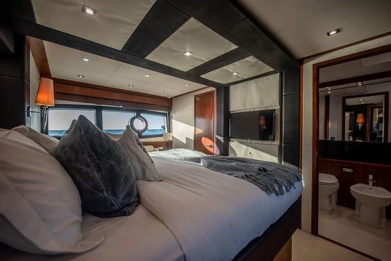 Slide: The Image of Luxurious bedroom interior of 2012 Sunseeker Manhattan 73 yacht with ocean view. - 74