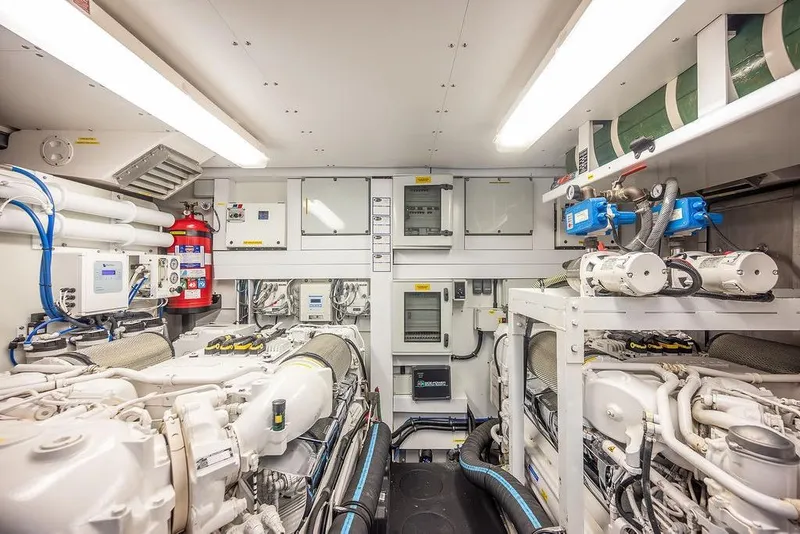Slide: The Image of Engine room of 2012 Sunseeker Manhattan 73 yacht, featuring advanced machinery and equipment. - 79