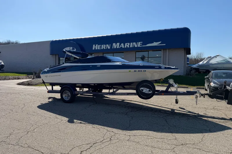 The Image of 2011 Crownline 21 SS boat on trailer outside Hern Marine dealership. - 0