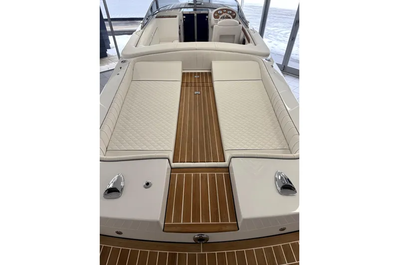 Slide: The Image of 2024 Comitti Venezia V28 luxury boat interior with elegant wood and leather design. - 15