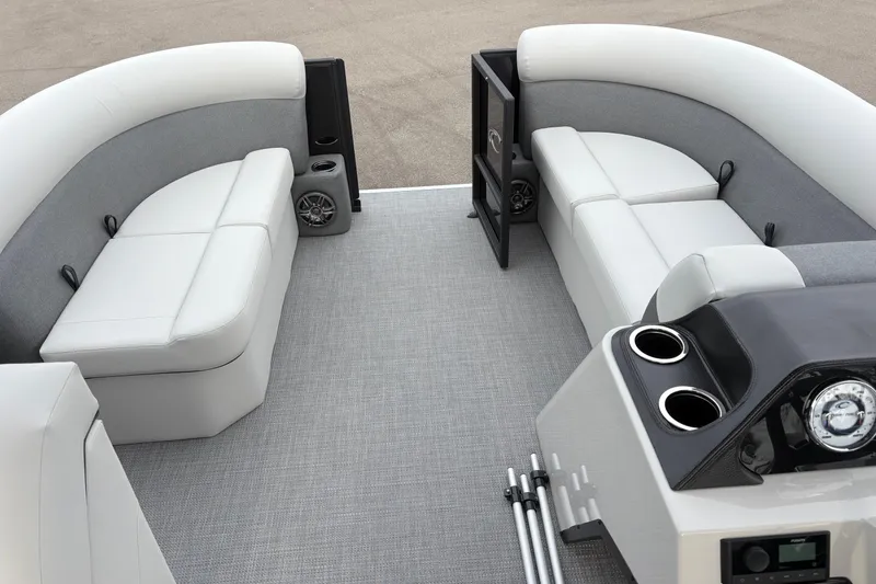Slide: The Image of Interior of 2026 Crest 200SE boat with plush seating and modern dashboard. - 10