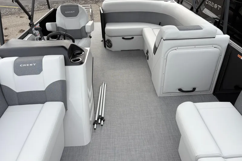 Slide: The Image of 2026 Crest 200SE boat interior with modern seating and steering console. - 5