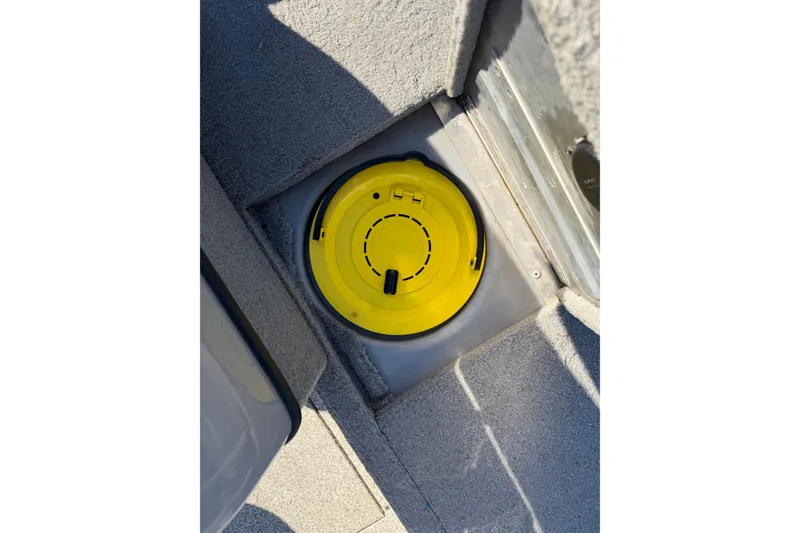 Slide: The Image of Yellow hatch on 2010 Tracker Pro Guide V-16 WT boat deck. - 4