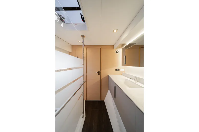 Slide: The Image of Modern bathroom interior of 2025 Fountaine Pajot FP41 Catamaran, featuring sleek design and fixtures. - 33