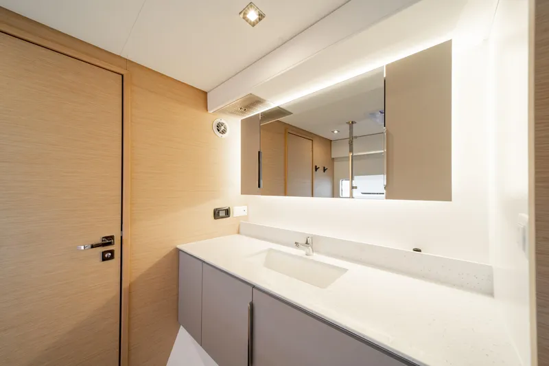 Slide: The Image of Modern bathroom interior of 2025 Fountaine Pajot FP41 Catamaran with sleek design and lighting. - 35