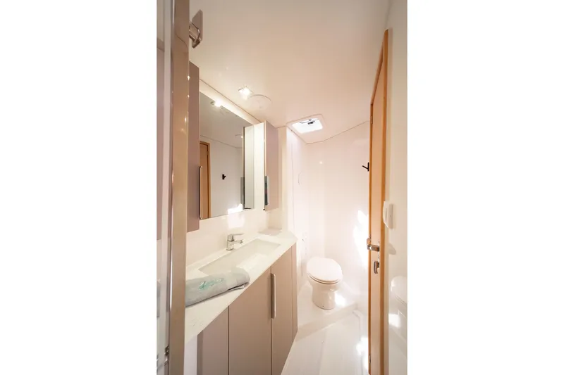 Slide: The Image of 2025 Fountaine Pajot FP41 Catamaran bathroom with modern fixtures and sleek design. - 41