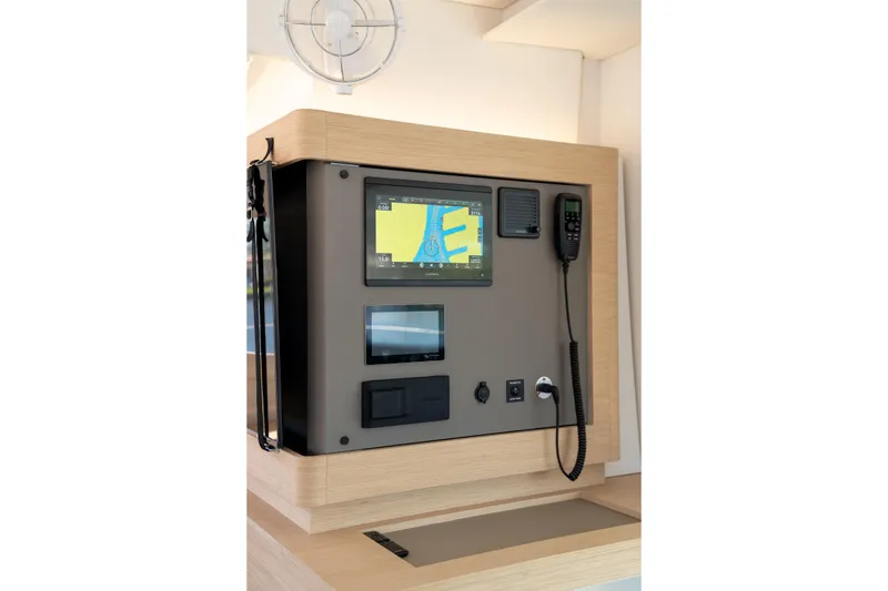 Slide: The Image of Navigation panel of 2025 Fountaine Pajot FP41 Catamaran with modern controls and display. - 51