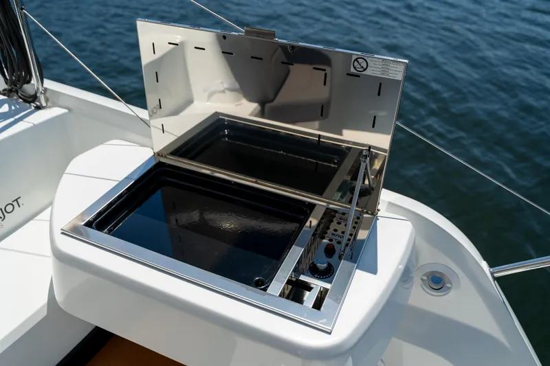 Slide: The Image of Outdoor grill on 2025 Fountaine Pajot FP41 Catamaran, overlooking the ocean. - 62