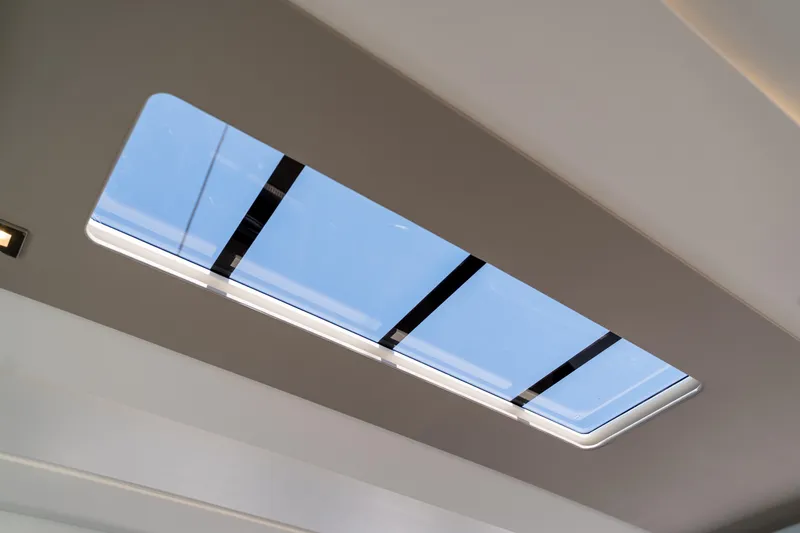 Slide: The Image of Skylight view from 2025 Fountaine Pajot FP41 Catamaran interior ceiling. - 63