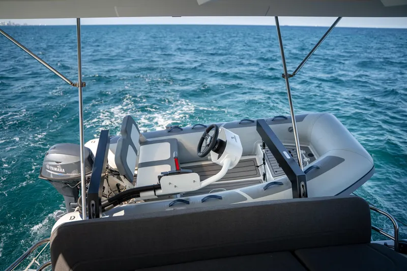Slide: The Image of 2025 Fountaine Pajot FP41 Catamaran with Yamaha motor on open sea. - 67